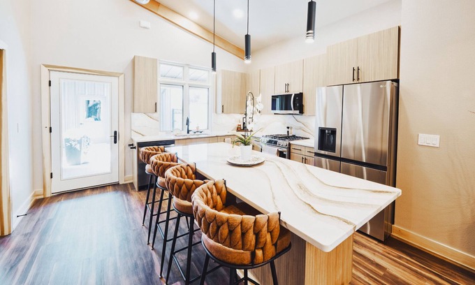 Sheridan House | 3BR luxury condo w/cozy fireplace - Perfect for holiday groups near the hospital & fairgrounds.