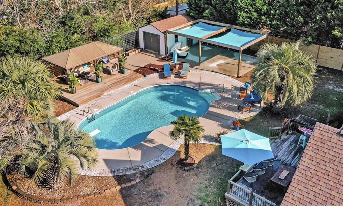Wilmington House | 4 bedroom 3 bath with tranquil saltwater pool oasis! Sleeps up to 12