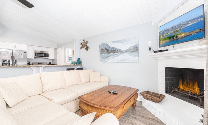 Balboa Peninsula Condo | 4BR Coastal Getaway between the Bay & Beach | Sunny Patio & Balcony!