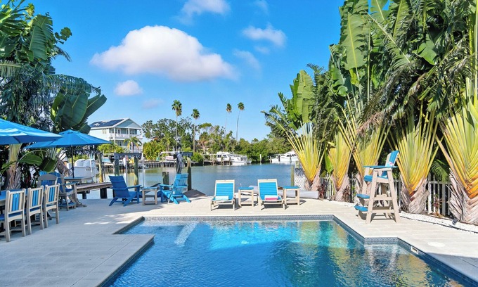Indian Rocks Beach House | 5 Bed WTFT heated pool dock 6 seat golf cart
