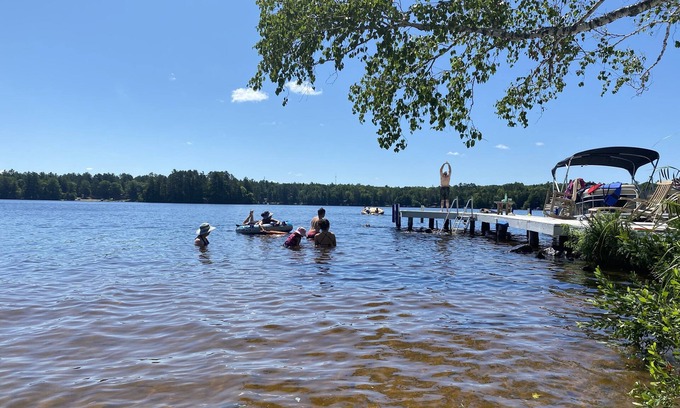 Eagle River House | 5 star on CATFISH LAKE wet boathouse, sandy beach, 5 bedroom, air cond
