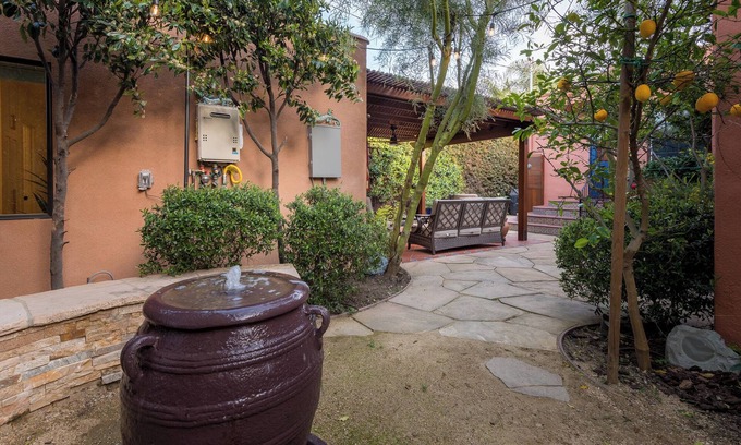 Pico - Robertson Cottage | 5-Star Urban Oasis with a Gourmet Kitchen, Tranquil Fountains and Fruit Trees