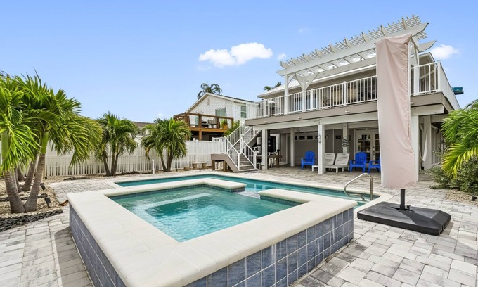Mid Island House | 5550 Palmetto Paradise: 3BR w/ Gulf Views, Heated Pool