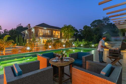 Virajpet Villa | 5BR Coffee & Mist Luxury Villa- Comp Breakfast, Pvt Pool, and Coffee Estate by StayVista