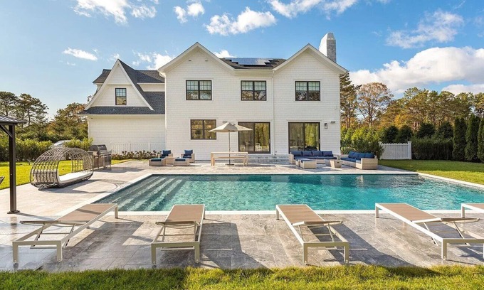 Shinnecock Hills House | 6,400 square foot traditional-style home with a private pool and sweeping...