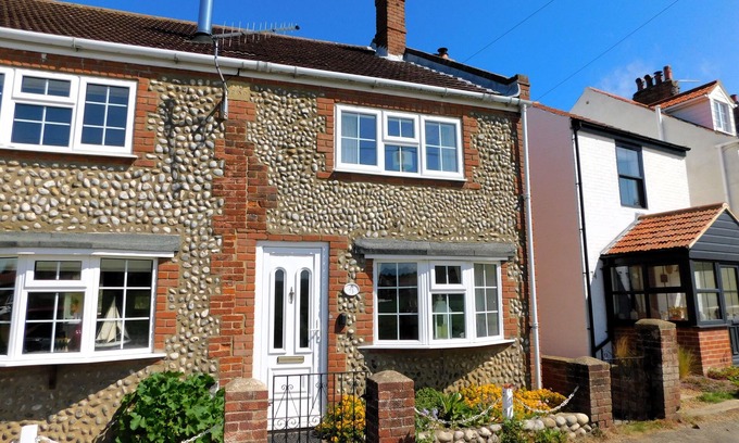 Sheringham Cottage | 73 Beeston Common - traditional brick and flint end terrace cottage has been renovated.