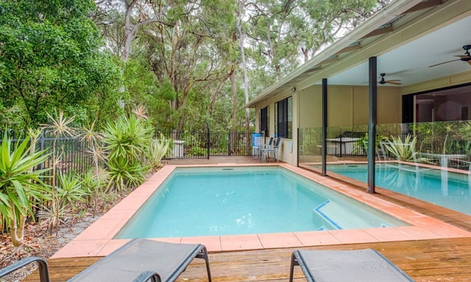 Rainbow Beach House | 8 Ibis Court - Rainbow Shores. Swimming Pool, Walk to Beach, Executive Beach House