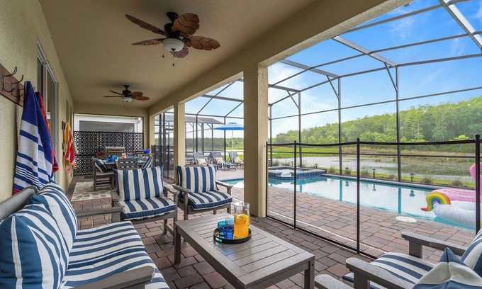 Kissimmee House | 9BR Family Villa – South-Facing Pool & Arcade Near Disney & Universal