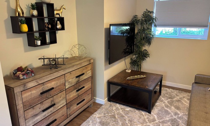 Departure Bay Apartment | A bright and cozy 1-bedroom basement suite is nestled in a lush garden setting