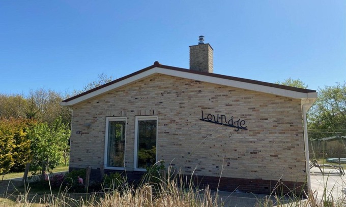 Municipality of Ameland House | A detached home Loundje located on the grounds of Klein Vaarwater in Buren.