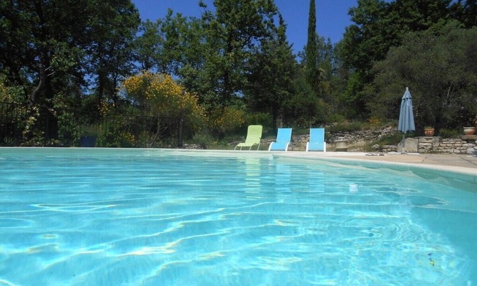 Collorgues House | A haven of peace in the shade of oak trees. 3 bedrooms, air conditioning, swimming pool, 2 terraces