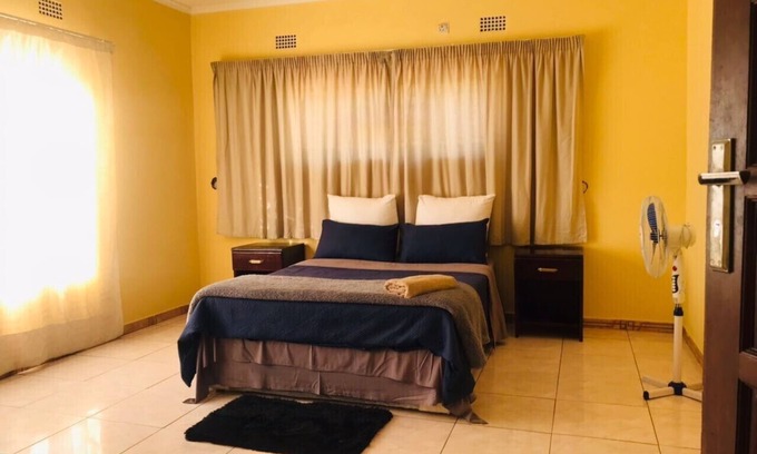 Livingstone House | A home away from home, cozy, quiet, close to T1, most amenities.