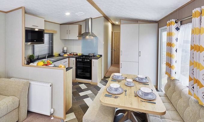 Cresswell House | A modern holiday home with one master double and two twin bedrooms.