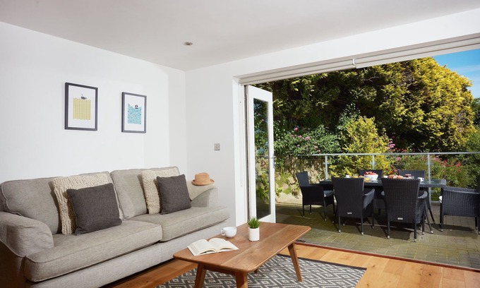 Carbis Bay Apartment | A stunning ground floor apartment with a large outdoor terrace and sea views.