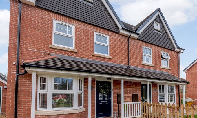 Woodhall Spa Cottage | A superb modern house with a hot tub set under a gazebo with twinkling fairly lights.