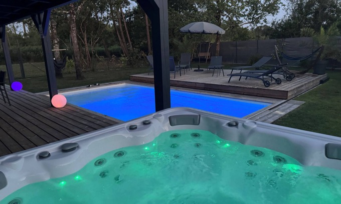 Biscarrosse House | Agréable Maison Neuve, Pergola, Terrasse Mobile , Piscine Chauffée, spa 6 Places