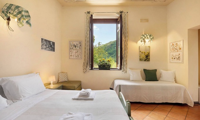 Fisciano Apartment | Agriturismo 'Quadruple Room with Garden View' with Mountain View and Air Conditioning