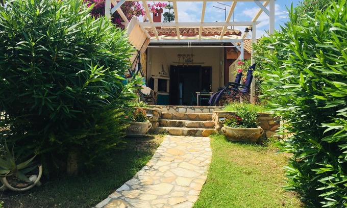 Costa Rei House | All inclusive. Pretty cottage with sea view within walking distance of the beach.
