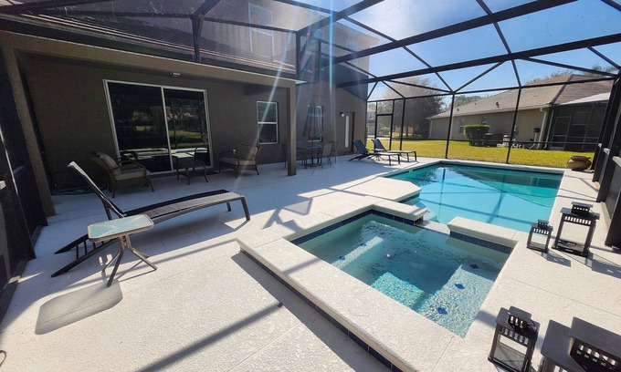 Calabria House | Amazing 5BD/5BA House with Pool and TV Near Disney