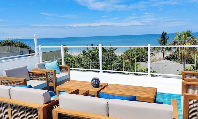 Indian Rocks Beach House | Amazing Oceanview Beach Mansion Private Warm Pool Sunset Rooftop, Trail to Beach