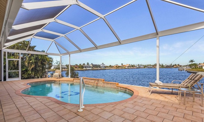 Burnt Store House | Amazing sunsets, Fishing from the dock, Large lanai & Pool - Villa Boa Vista - Roelens Vacations