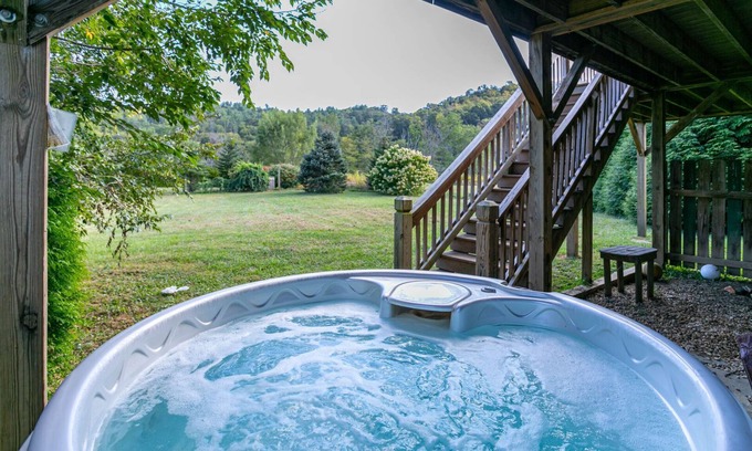 Todd Cabin | Andrews River Haven - River Front with hot tub-Cozy, Fun for Kids, Pet Friendly!