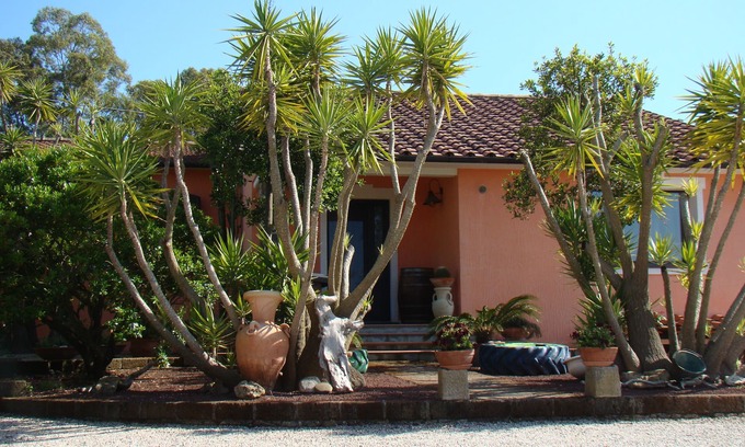 Capoliveri Apartment | Apartment 'Appartamento Zizzolo' with Private Terrace, Private Garden and Wi-Fi