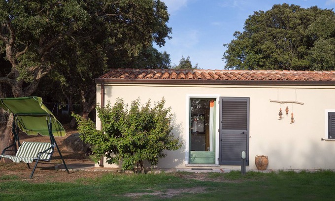 Aglientu Apartment | Apartment 'Asfodelo' with Shared Pool, Private Garden and Air Conditioning