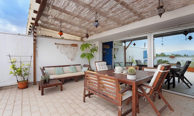 Viareggio Apartment | Apartment 'Attico Con Terrazza A Viareggio' with Mountain View, Shared Terrace and Air Conditioning