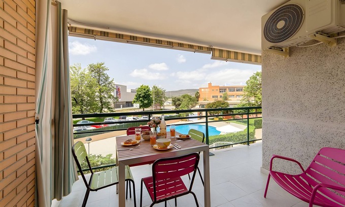 Grao de Gandia Apartment | Apartment 'Calma Mar' with Shared Pool, Wi-Fi and Air Conditioning