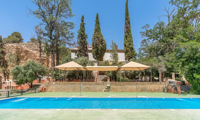 Guadix Apartment | Apartment 'Cueva Maiz' with Mountain View, Shared Pool and Wi-Fi