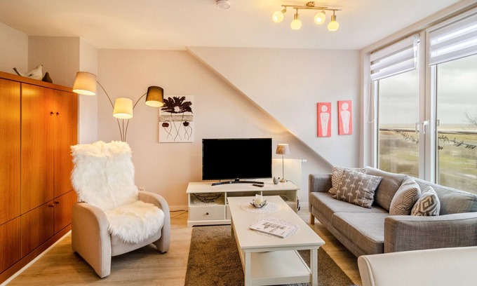 Norderney House | Apartment 'Ferienhaus Raschke' with Sea View, Private Terrace and Wi-Fi