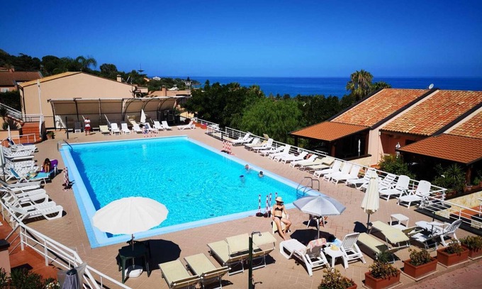 Cefalu Apartment | Apartment in a residence with swimming pool overlooking the sea useful for families with children