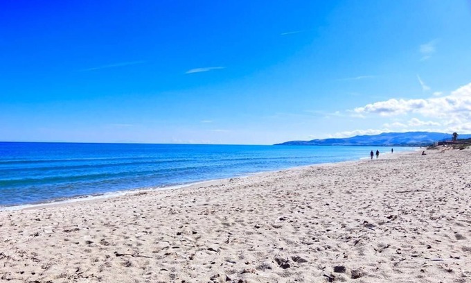 Sorso House | Apartment in villa with garden close to the sea