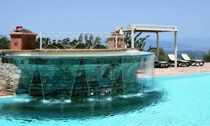 Chianni Villa | Apartment in villa with pool, hot tub, sauna, WIFI, TV, patio, pets allowed, panoramic view, parking