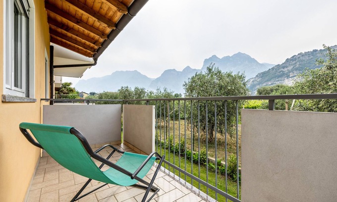 Torbole sul Garda Apartment | Apartment 'N4 Appartamento Blu' with Mountain View, Shared Garden and Balcony
