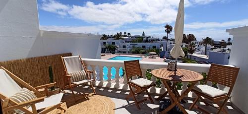 Los Mojones Apartment | Apartment Paraiso III - Pool & Sea view - good Wifi- Residence Loma Verde