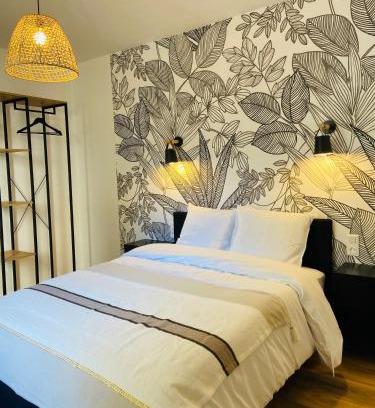 Pontarlier Apartment | Appartement 2 chambres avec terrasse vue sur jardin arboré