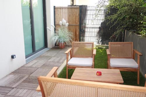 Quartier du Vieux-Pont - Sainte-Genevieve Apartment | Appartement chaleureux à 10 minutes de la Défense