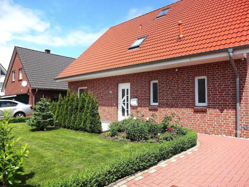 Burg auf Fehmarn Apartment | Appartement in Burg Auf Fehmarn mit Terrasse, Garten und Grill