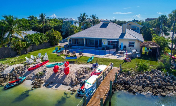 Stuart House | Aquatopia South: Riverfront Beach House, Steps 2 Ocean. Heated Pool & Dock!