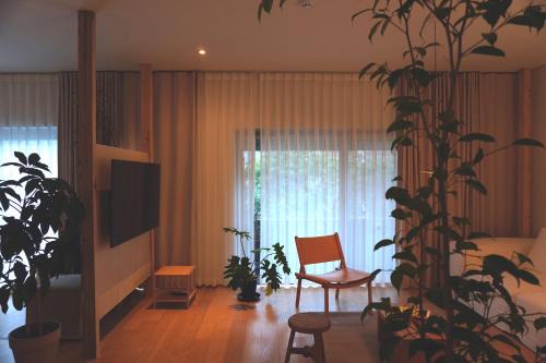 Downtown House | At corner resort & garden