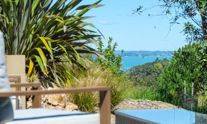 Palm Beach Cabin | Awaawa Yurts - Combined - 3 Yurt Package - Awaawa Yurts offer a luxury glamping experience on Waiheke Island. Stunning views, luxury queen sized bed, private bathroom with tea and coffee making facilities.