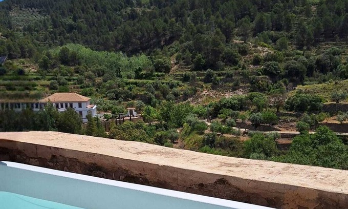 Alcoleja House | "Balcón de Aitana" : rural house with large terrace, jacuzzi and mountain views.