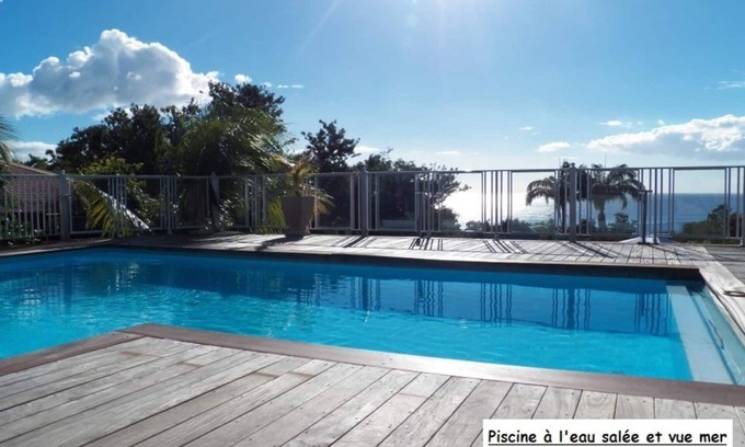 Deshaies Apartment | Bamboo apartment in a postcard setting overlooking the Caribbean Sea