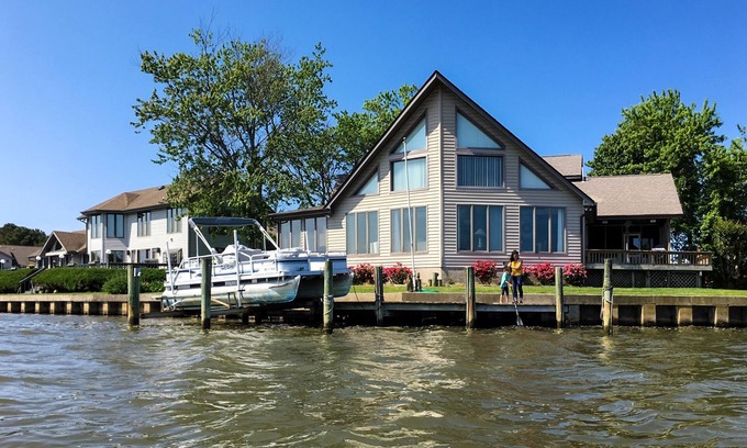 Ocean Pines House | Bayfront Home on Deep Water with dock, bay-view deck, WiFi & community pools