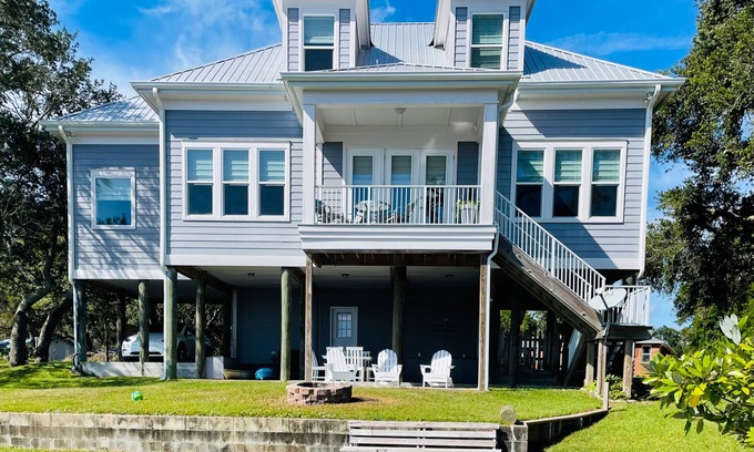 Navarre House | Bayfront home with private pier, boat moorage, patio, & amazing water views