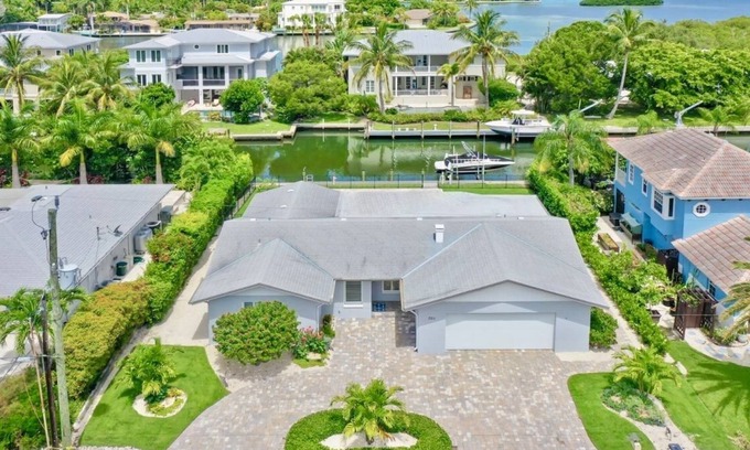 Whitney Beach House | Beach Bungalow: Pet Friendly, Best Canal, Dock, Beach, Pool. Renovated in 2025