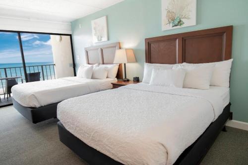 Litchfield by the Sea Apartment | Beaches and Dreams 4th Flr Oceanfront Room