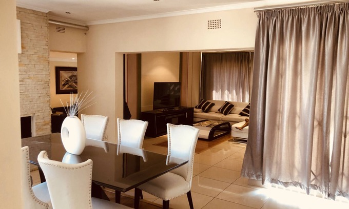 Greater Johannesburg Metropolitan Area House | Beatiful home with Open plan Two lounges and Morden kitchen main room king bed